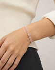 Macaron Drop Cord Bracelet - Pink puesto en modelo - Queens Candy