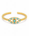 Anillo ajustable Queens Candy de latón bañado en oro con diseño de ojo turco, zirconias y turquesas sintéticas.