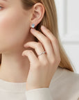 Queens Candy gold-plated sterling silver stud earrings featuring an oval aquamarine and marquise cubic zirconia.