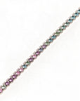 Queens Candy silver tennis necklace featuring round-cut multicolor cubic zirconia stones in a rhodium-plated setting.