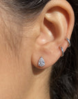 Pear Shape Moissanite Studs - combinados en un ear stack - Queens Candy
