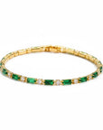 Pulsera tennis Queens Candy ajustable en cobre dorado con zirconias rectangulares verdes esmeralda y blancas