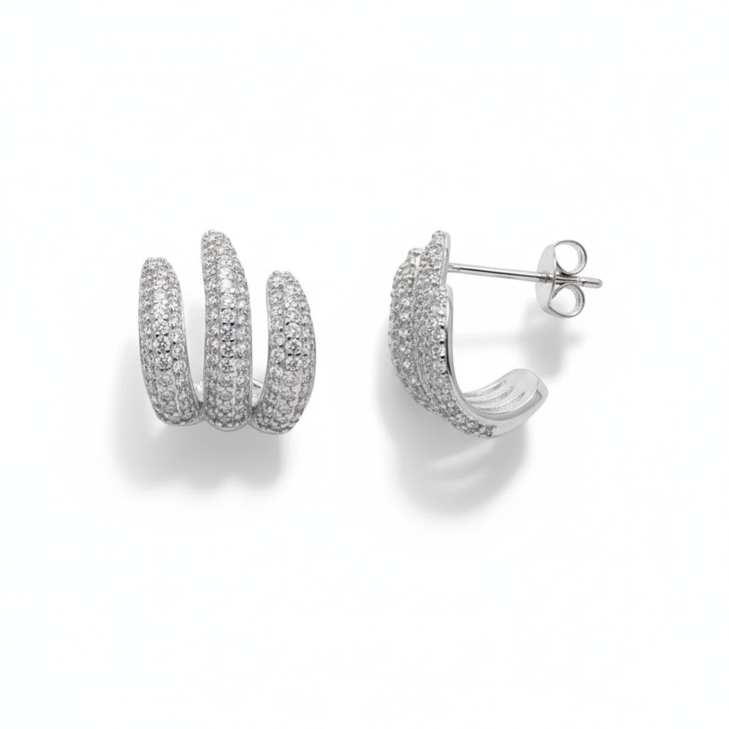 Queens Candy silver-plated brass hoop earrings with rhodium plating and pave-set cubic zirconia.