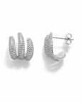 Queens Candy silver-plated brass hoop earrings with rhodium plating and pave-set cubic zirconia.
