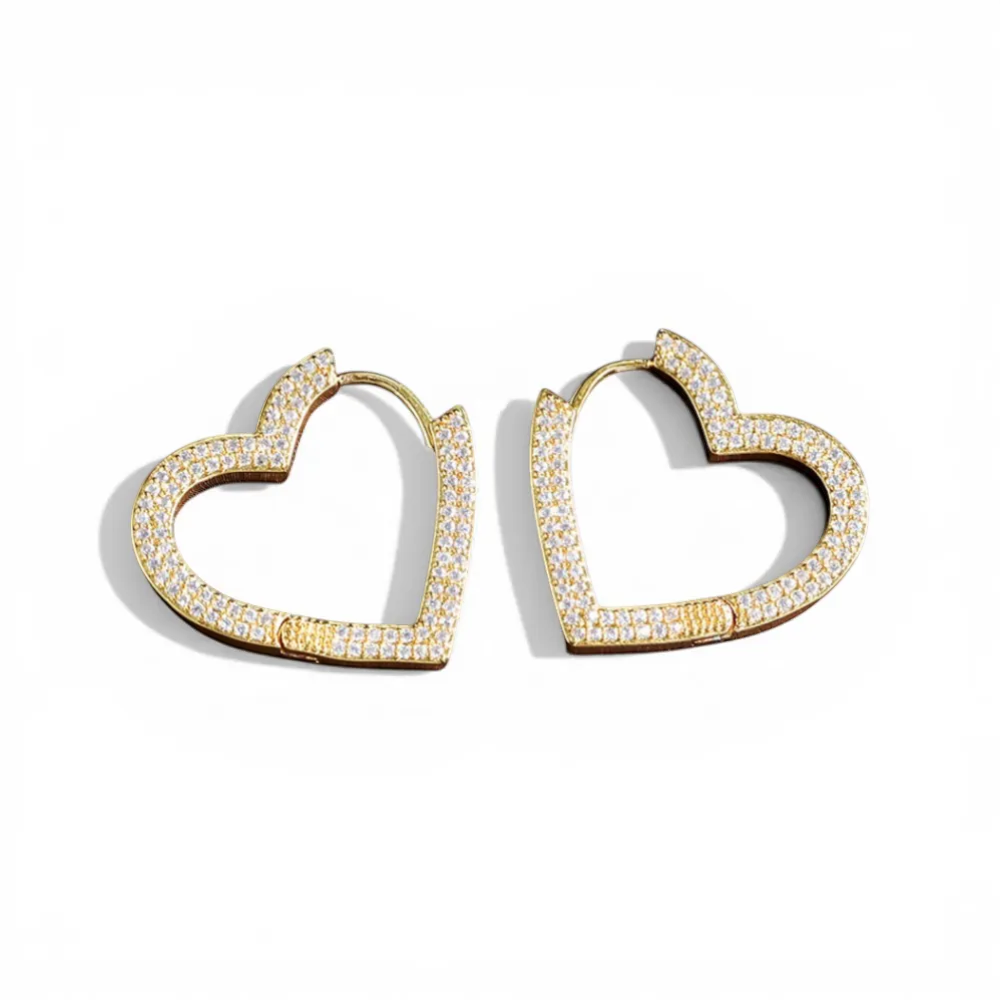 Queens Candy Sugar Heart gold hoop earrings with pave cubic zirconia detail. Rhodium plated copper, 2.5mm.