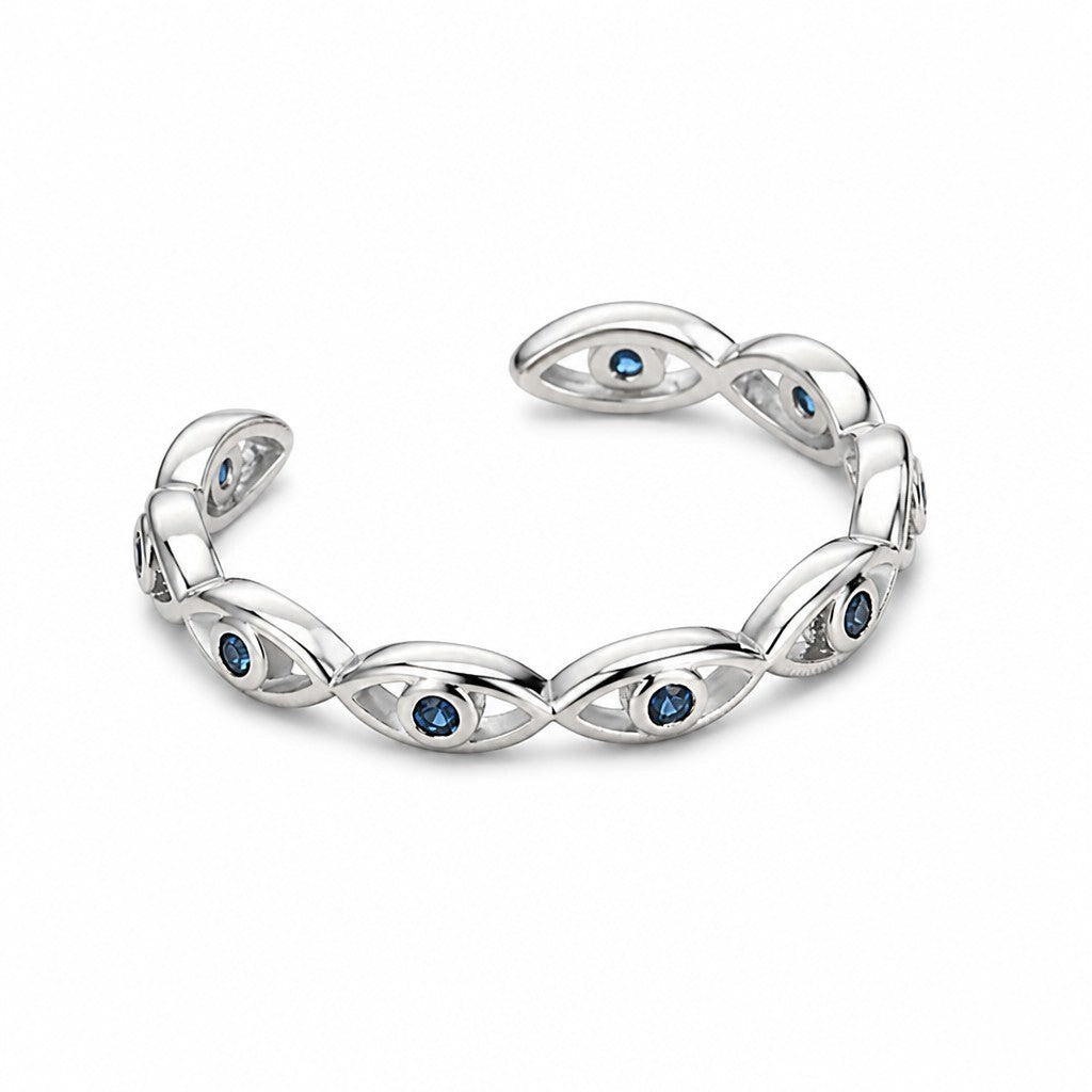 Anillo ajustable Queens Candy de metal plateado con diseño de ojos turcos y zirconias azules brillantes