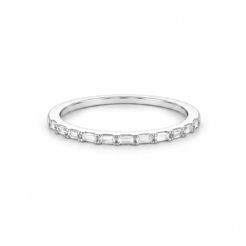 Queens Candy thin stackable ring in silver-plated 925 sterling with baguette-cut cubic zirconia stones.