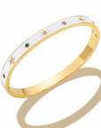 Brazalete Queens Candy Honey Star de acero dorado con esmalte blanco, estrellas y zirconias multicolor.