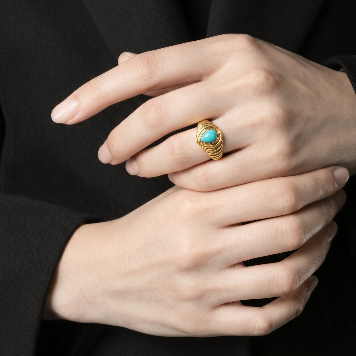 Queens Candy adjustable gold-plated sterling silver ring featuring a teardrop turquoise stone and ribbed band detail