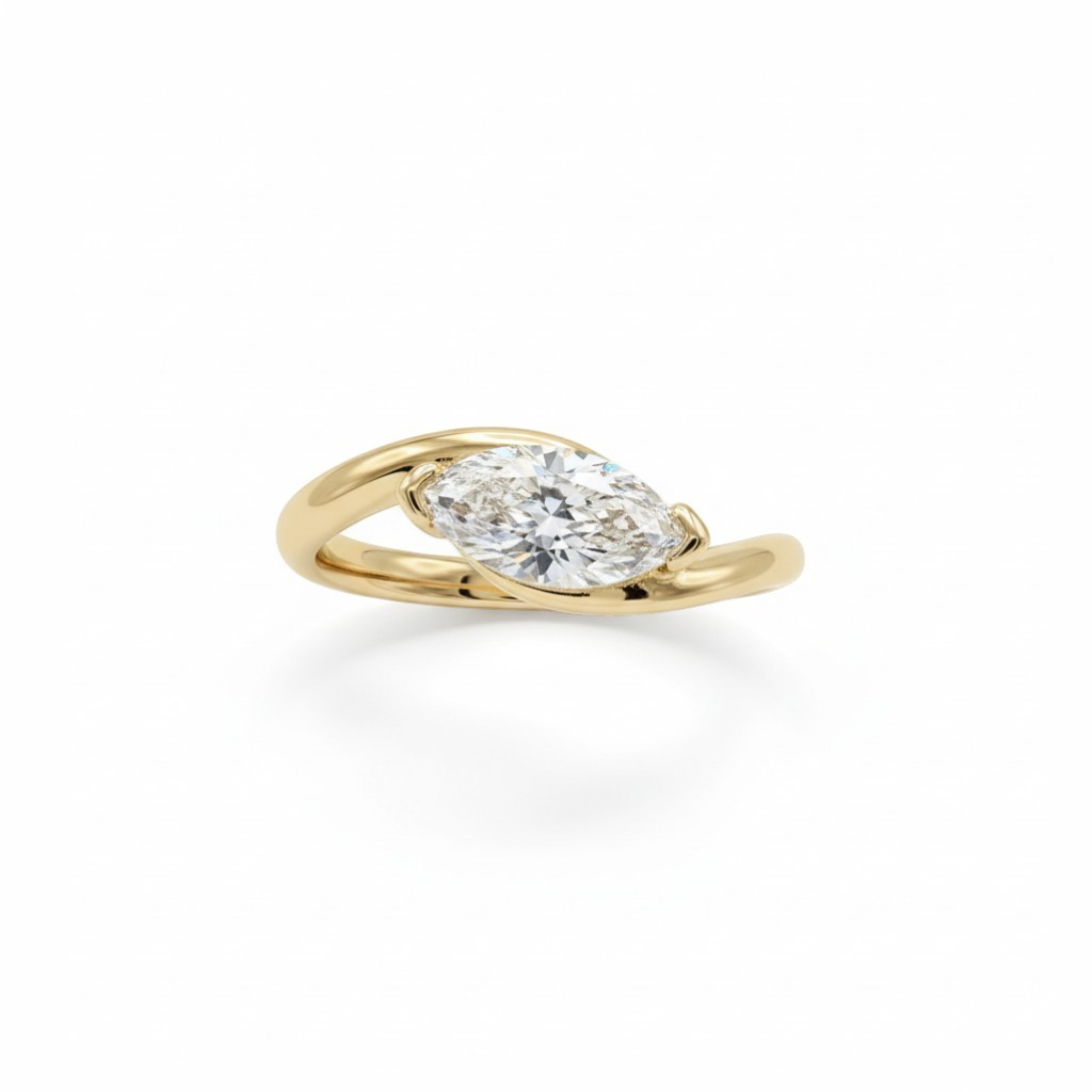 Queens Candy gold plated sterling silver ring with a 2ct marquise cut 5A cubic zirconia.