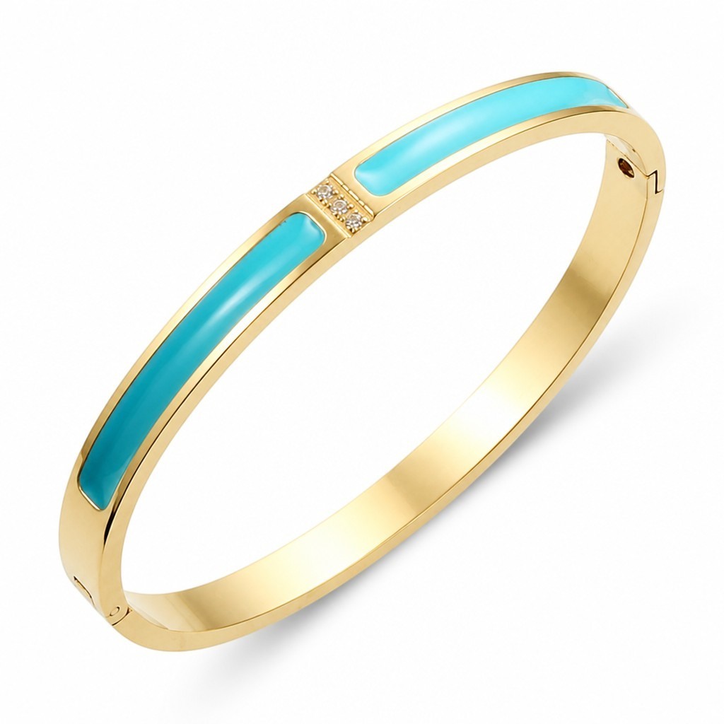 Pulsera bangle Queens Candy de acero dorado con esmalte azul brillante y detalles de estrellas con zirconias