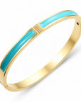 Pulsera bangle Queens Candy de acero dorado con esmalte azul brillante y detalles de estrellas con zirconias