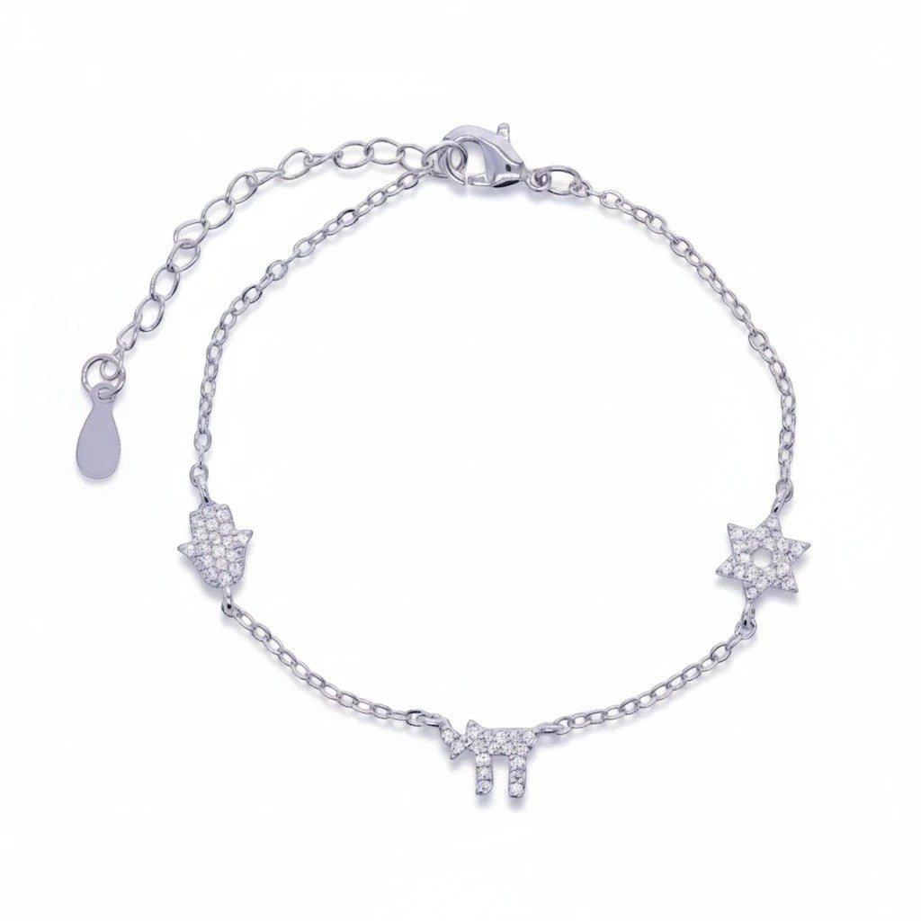 Pulsera Queens Candy de plata con dijes de hamsa, estrella de David y chai decorados con zirconias brillantes