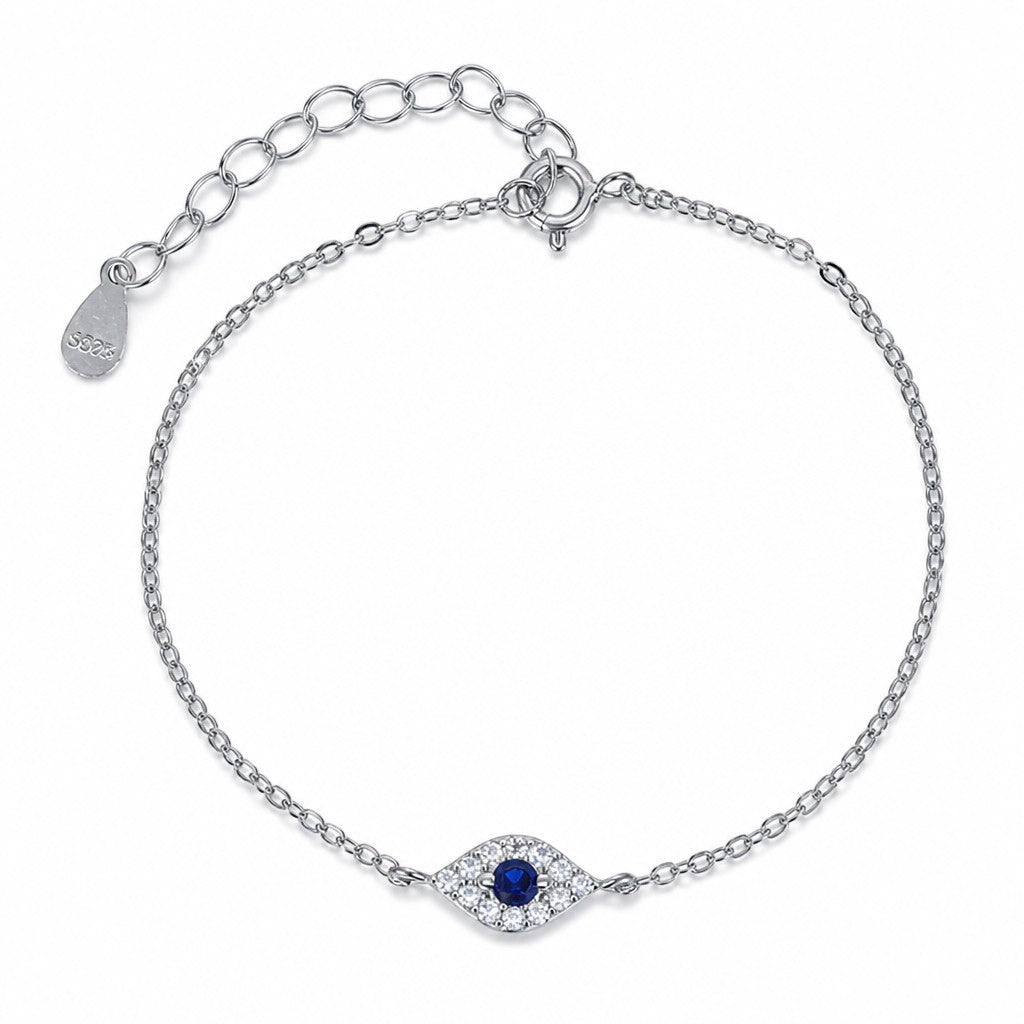Pulsera Queens Candy Sweet Gaze de plata 925 con dije de ojo turco, zirconias azules y blancas y cadena ajustable.