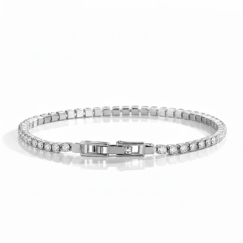 Pulsera tennis Queens Candy en cobre con baño platinum y zirconias cúbicas brillantes de 2.5mm con cierre elegante