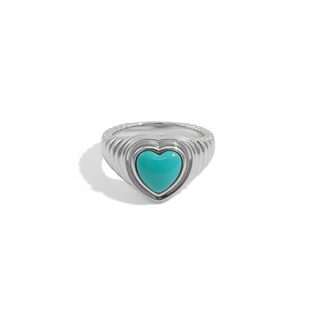 Queens Candy adjustable silver ring featuring a heart-shaped turquoise stone and a ribbed band design.