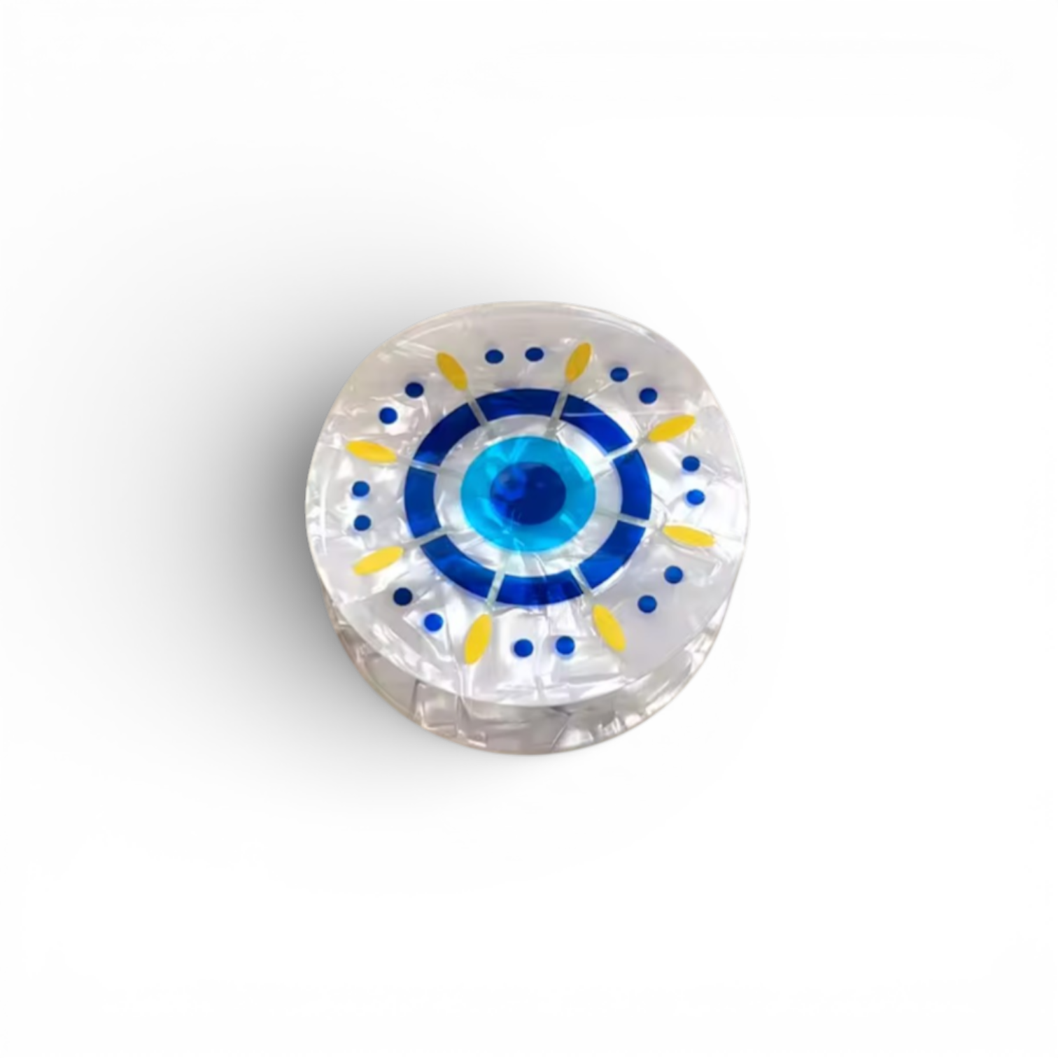 Queens Candy acrylic hair claw clip with blue and yellow evil eye design on a pearlescent white base.